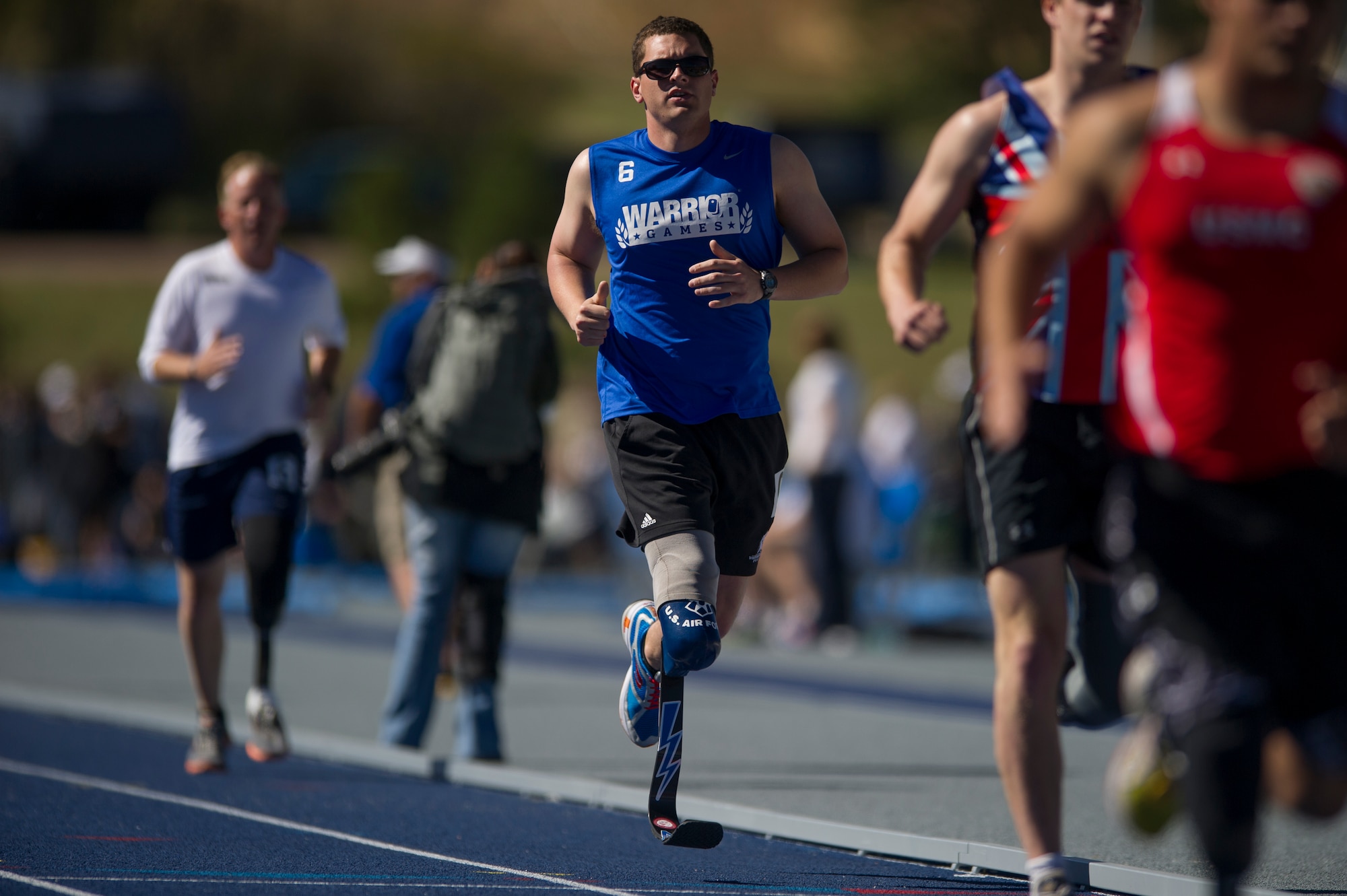First Lt. Ryan McGuire, Joint Base Lewis-McChord C-17 pilot, runs the 1,500-meter run and earns a gold medal at the 2012 Warrior Games held at the U.S. Air Force Academy, Colorado Springs, Colo. McGuire won a total of five medals at the 2012 Warrior Games to add to his three medals he won from the 2010 inaugural Warrior Games. (Courtesy photo) 