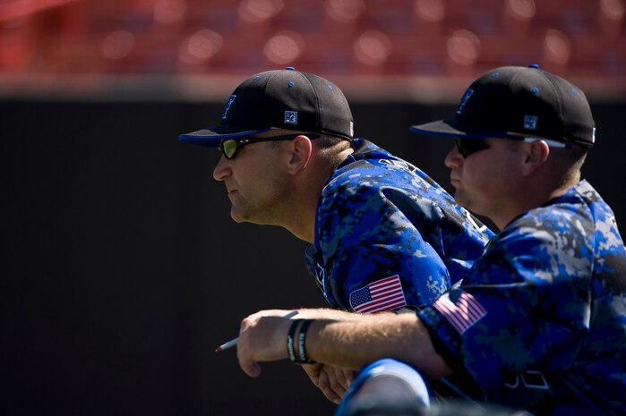 U.S. Air Force retired Maj. Mike Kazlausky, USAF Academy Falcons head coach, and Mark Crocco, assistant coach, watch the game against the University of Nevada, Las Vegas Rebels April 21, 2012, at Earl E. Wilson Stadium in Las Vegas, Nev. Kazlausky and his staff have been coaching for the Academy for two years. (U.S. Air Force photo by Airman 1st Class Daniel Hughes)