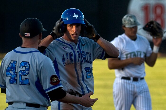 Cadet Alex Bast, U.S. Air Force Academy Falcons outfielder, talks with assistant coach Toby Bicknell, during a game against the University of Nevada, Las Vegas Rebels April 20, 2012, at Earl E. Wilson Stadium in Las Vegas, Nev. Bast went 1-4 at the plate with one strike out and a pop out. (U.S. Air Force photo by Airman 1st Class Daniel Hughes)