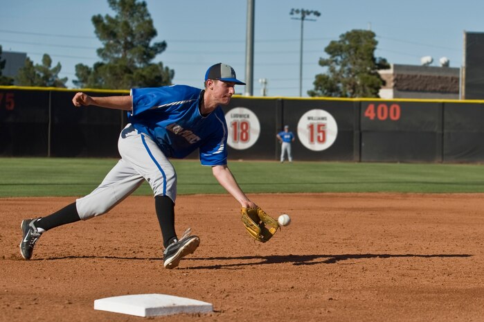 Cadet Tyler Saleck, U.S. Air Force Academy Falcons infielder, scoops up a ground ball  during infield practice before a game against the University of Nevada, Las Vegas Rebels  April 20, 2012, at Earl E. Wilson Stadium in Las Vegas, Nev. The Falcons took two out of three games earlier in the season. (U.S. Air Force photo by Airman 1st Class Daniel Hughes)