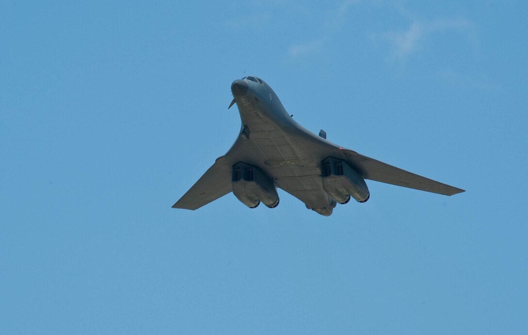 A B-1 thunders over the base flightline during a warrior flyby at Ellsworth Air Force Base, S.D., May 4, 2012. During the warrior flyby aircrews demonstrated the show of force combat tactic, dropping to low level and passing over at a high rate of speed. The B-1 is a long-range, multi-role heavy bomber that can reach speeds of 900-plus miles per hours. (U.S. Air Force photo by Airman 1st Class Zachary Hada.)    