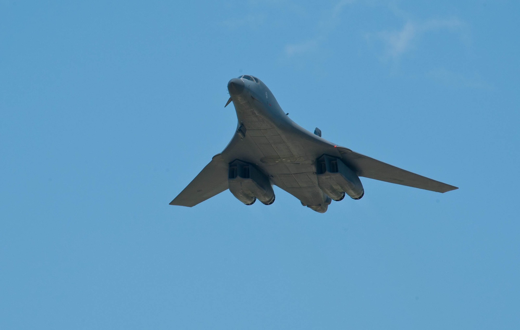 A B-1 thunders over the base flightline during a warrior flyby at Ellsworth Air Force Base, S.D., May 4, 2012. During the warrior flyby aircrews demonstrated the show of force combat tactic, dropping to low level and passing over at a high rate of speed. The B-1 is a long-range, multi-role heavy bomber that can reach speeds of 900-plus miles per hours. (U.S. Air Force photo by Airman 1st Class Zachary Hada.)    