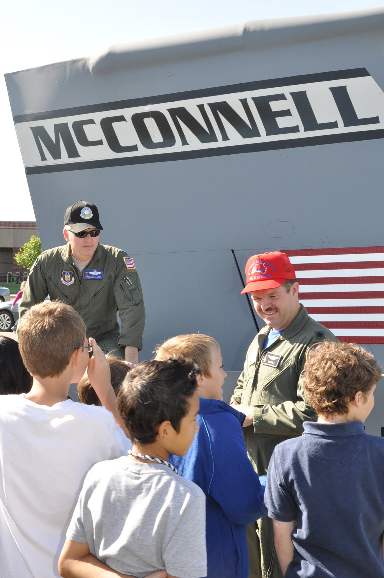 Lt. Col. Barry Jones, commander, 931st Operations Support Squadron, Air Force Reserve Command and Lt. Col. Pete Austin, deputy commander, 184th Intelligence Group, Air National Guard, field questions from students about Air Force career opportunities during the Careers on Wheels event at Sunrise Elementary School in Andover, May 9. More than 325 students from five local elementary schools took part in the event. Twenty-three organizations representing a variety of industries and career fields provided presenters who offered insights into their work. (Air Force photo by Tech. Sgt. Brannen Parrish)
