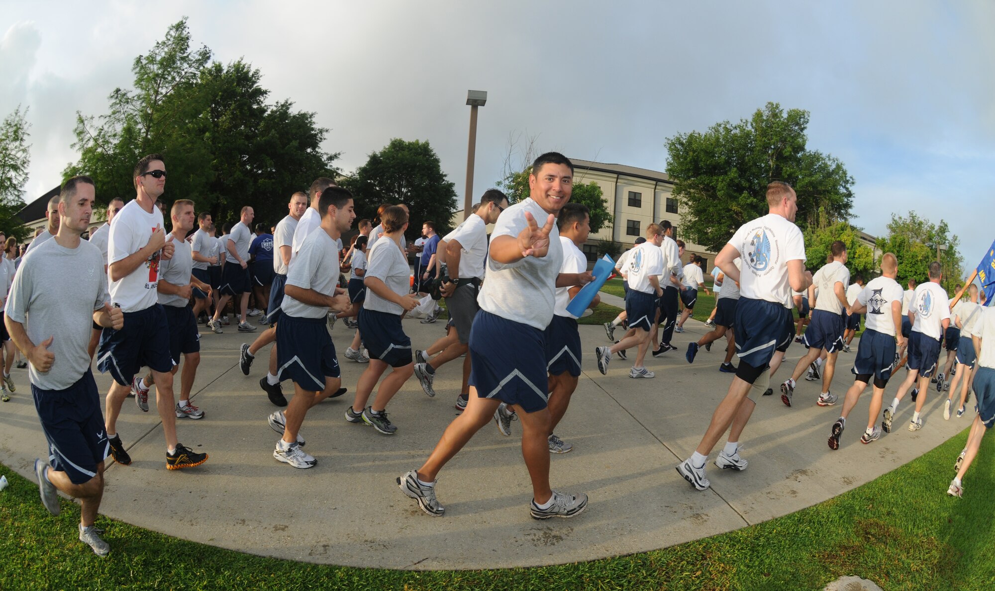 A 5K run, beginning at the Levitow Training Support Facility, kicks off Sports Day at Keesler Air Force Base, Miss., May 4, 2012. Sports Day was held in conjunction with May’s National Physical Fitness and Sports Month.  The event consisted of a variety of sports with participation from the many squadrons on base.  The winner of the small squadron division was 81st Training Support Squadron and the winner of the large squadron division was the 334th Training Squadron.  (U.S. Air Force photo by Kemberly Groue)