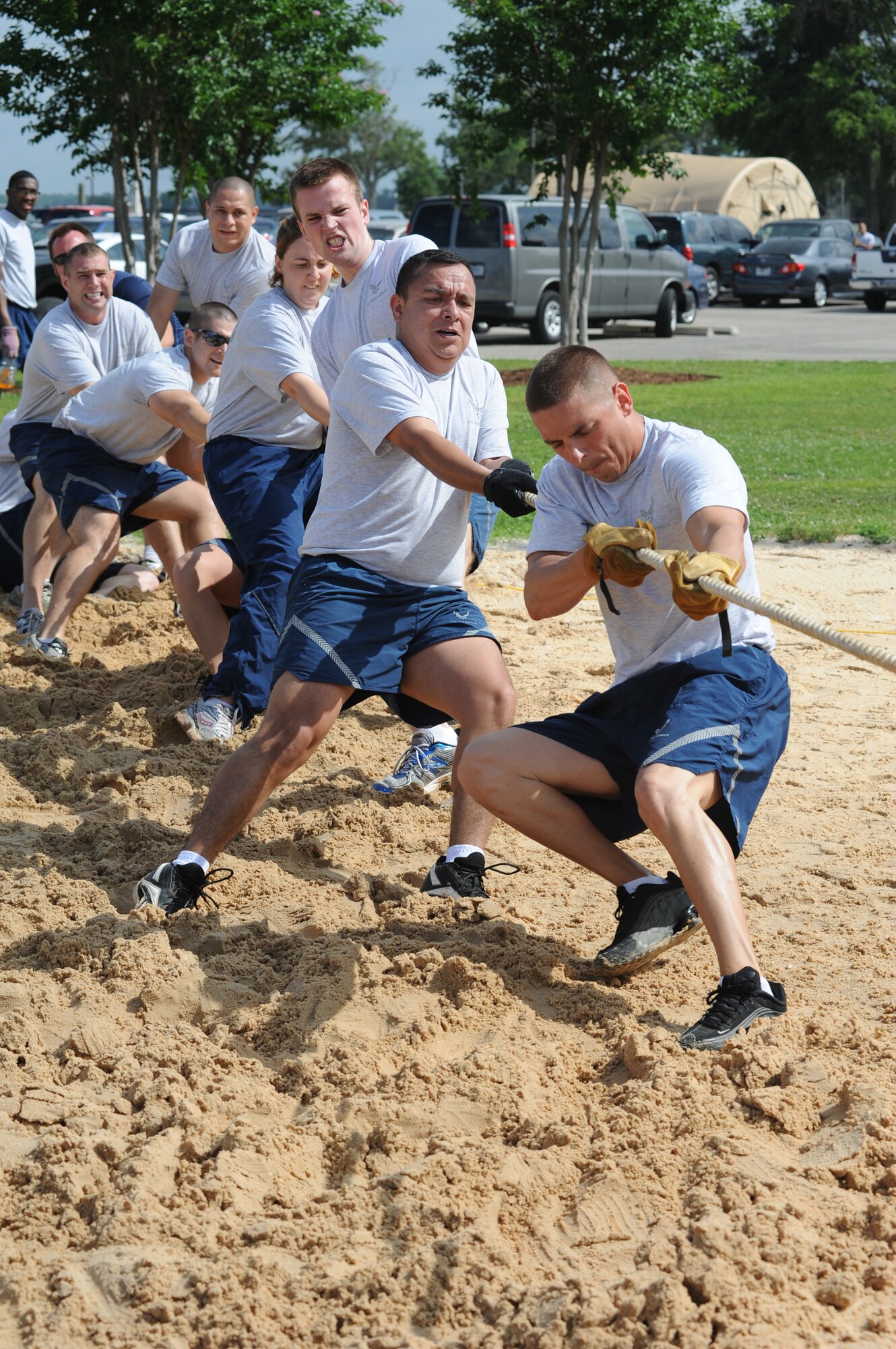 Members of the 81st Logistics Readiness Squadron pull the rope with all of their might in the tug-of-war competition against the 81st Diagnostic and Therapeutics Squadron during Sports Day May 4, 2012, at Keesler Air Force Base, Miss.  Sports Day was held in conjunction with May’s National Physical Fitness and Sports Month.   The event consisted of a variety of sports with participation from the many squadrons on base.  The winner of the small squadron division was 81st Training Support Squadron and the winner of the large squadron division was the 334th Training Squadron.  (U.S. Air Force photo by Kemberly Groue)