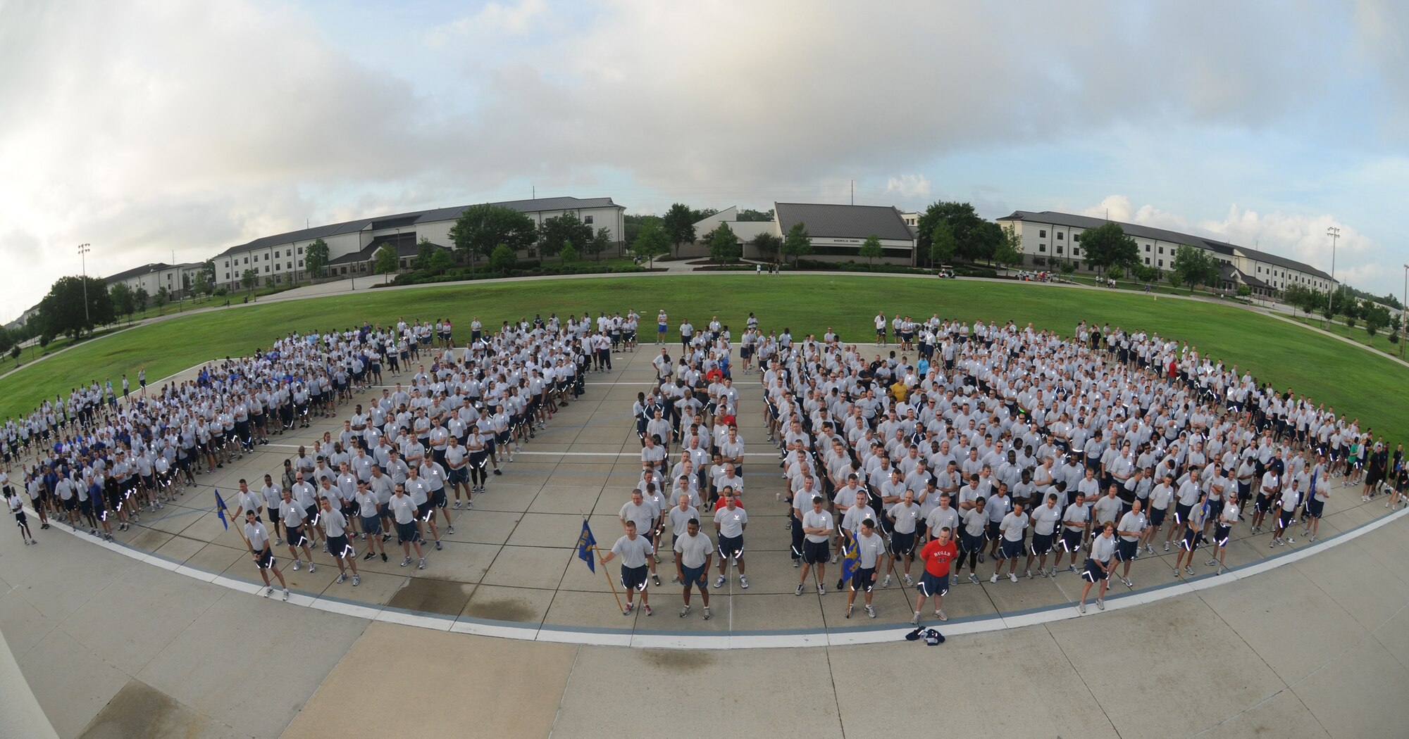 Sports Day participants are welcomed by Brig. Gen. Andrew Mueller, 81st Training Wing commander, as they await the start of the 5K run, on the drill pad behind the Levitow Support Facility May 4, 2012, at Keesler Air Force Base, Miss.  Sports Day was held in conjunction with May’s National Physical Fitness and Sports Month.  The event consisted of a variety of sports with participation from the many squadrons on base.  The winner of the small squadron division was 81st Training Support Squadron and the winner of the large squadron division was the 334th Training Squadron.    (U.S. Air Force photo by Kemberly Groue)