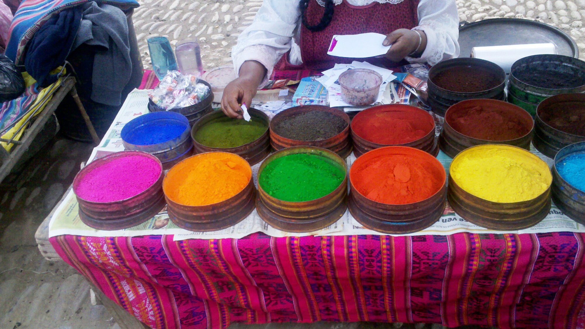 Pictured is a market’s booth where natural dyes and Incan crafts are being sold. 
