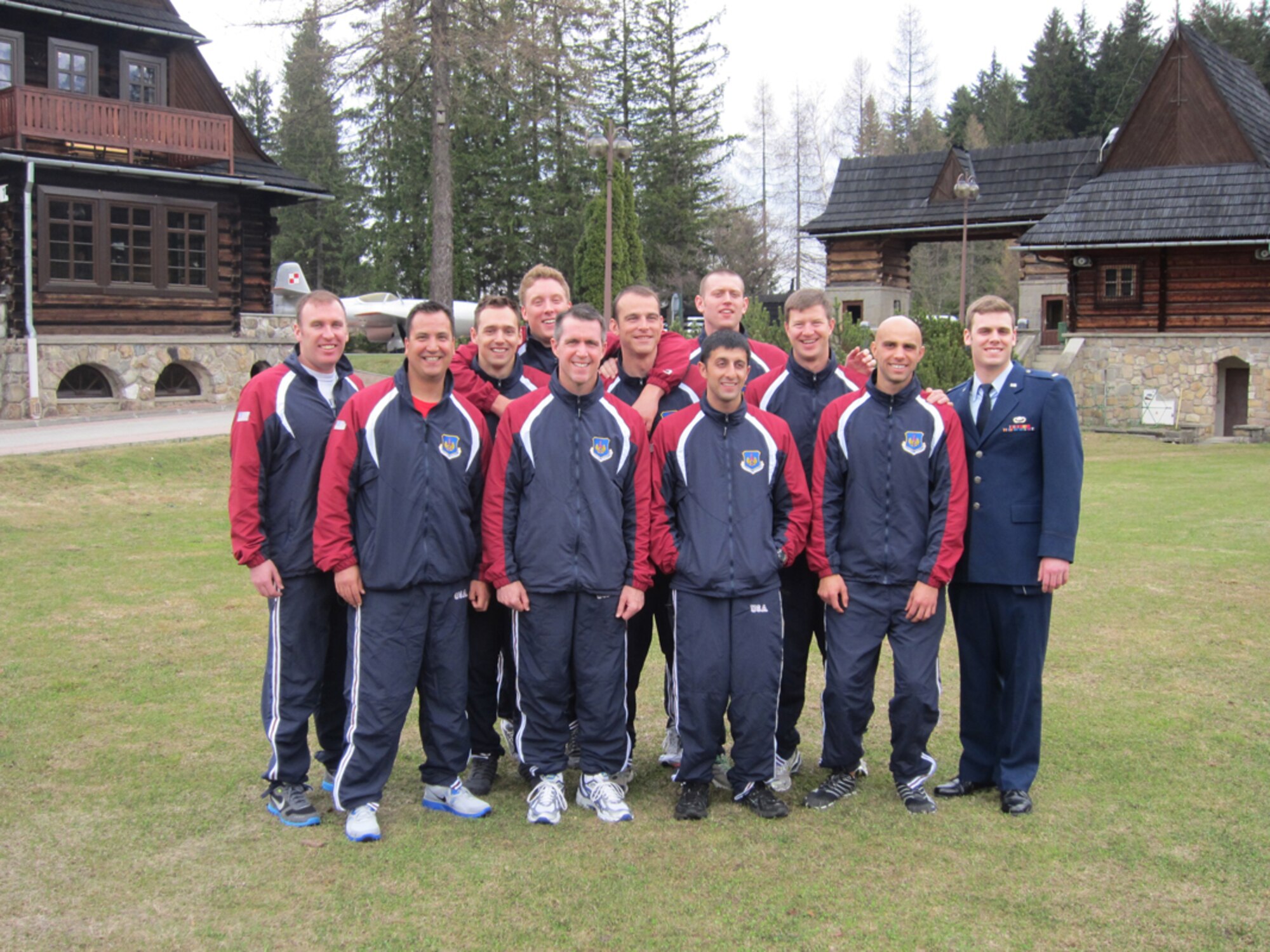 AEDC’s Capt. John Dayton, back center, poses for a group photo with the rest of the Air Force’s swim team April 19 in Zakopane, Poland. Dayton won first place in the 100-meter breaststroke at the Headquarters Allied Air Command Ramstein Swimming Championships. The men’s team placed second overall in the competition, which five other countries also competed in. (Photo provided)