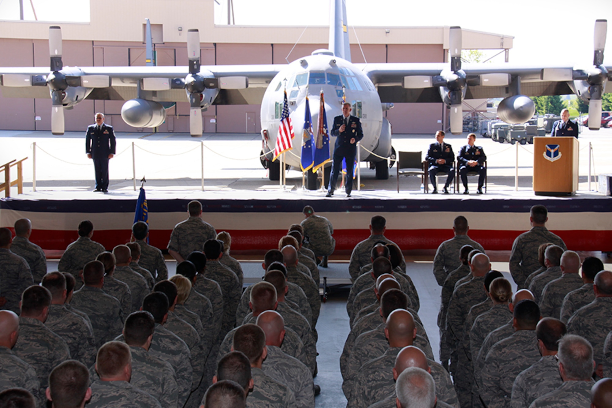 Maj. Gen. Wallace “Wade” Farris, commander, 22nd Air Force, expresses his appreciation of military service to the men and women of the 911th Airlift Wing during a Change of Command ceremony held at hangar 416, May 6, 2012. During this official event, Maj. Gen. Farris passed the guidon on to the newly assigned 911th AW Commander, Col. Craig C. Peters, who assumed command of the Air Force Reserve Base. (U.S. Air Force photo by Airman 1st Class Justyne Obeldobel/ Released)