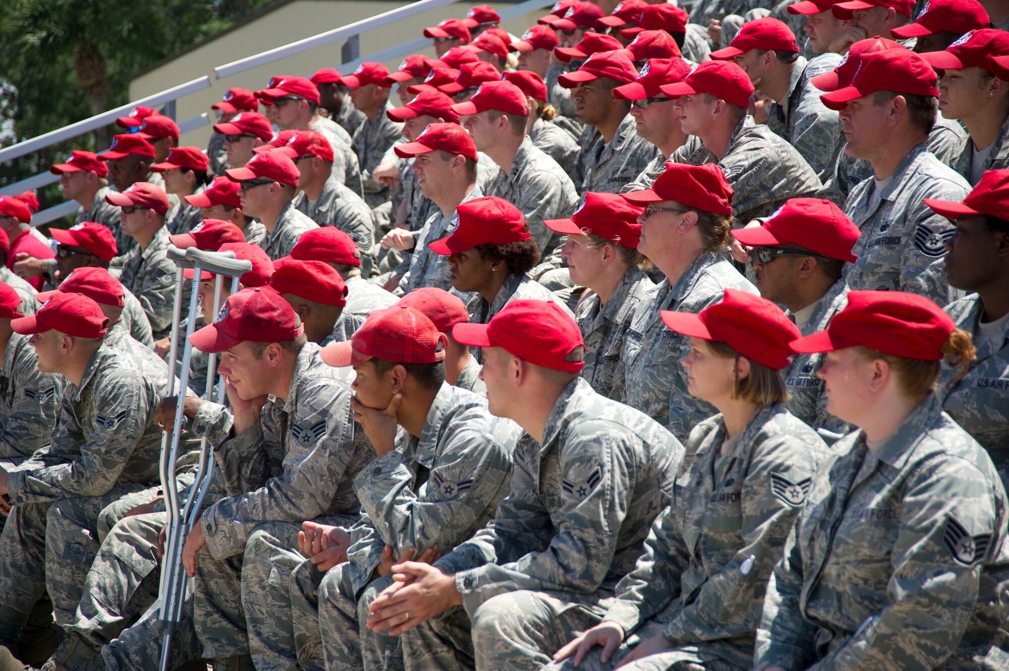 U.S. Air Force Airmen of the 823rd and 556th RED HORSE Squadrons watch the dedication ceremony of the RED HORSE Unity Park at the 823rd RED HORSE Compound on Hurlburt Field, Fla., May 5, 2012.  The park features a horseshoe used to memorialize those who have fallen while assigned to the 556th and 823rd RED HORSE Sqaudrons.  (U.S. Air Force Photo by Airman 1st Class Naomi M. Griego/RELEASED)
