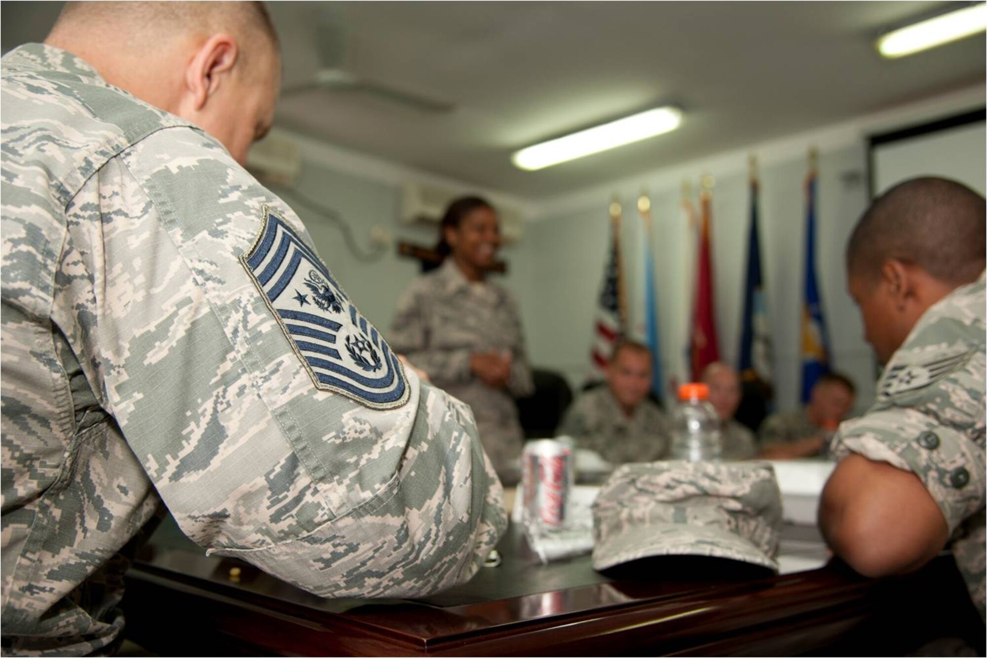 Chief Master Sgt. of the Air Force James A. Roy shares lunch with a  group U.S. Air Force staff and technical sergeants deployed to Camp Lemonnier, Combined Joint Task Force – Horn of Africa and other tenant commands at CJTF-HOA commander’s conference room here May 6. Roy interacted with the Airmen to address their concerns and share information regarding the Air Force directly from a senior enlisted leadership perspective. (U.S. Air Force photo by Senior Airman Lael Huss)