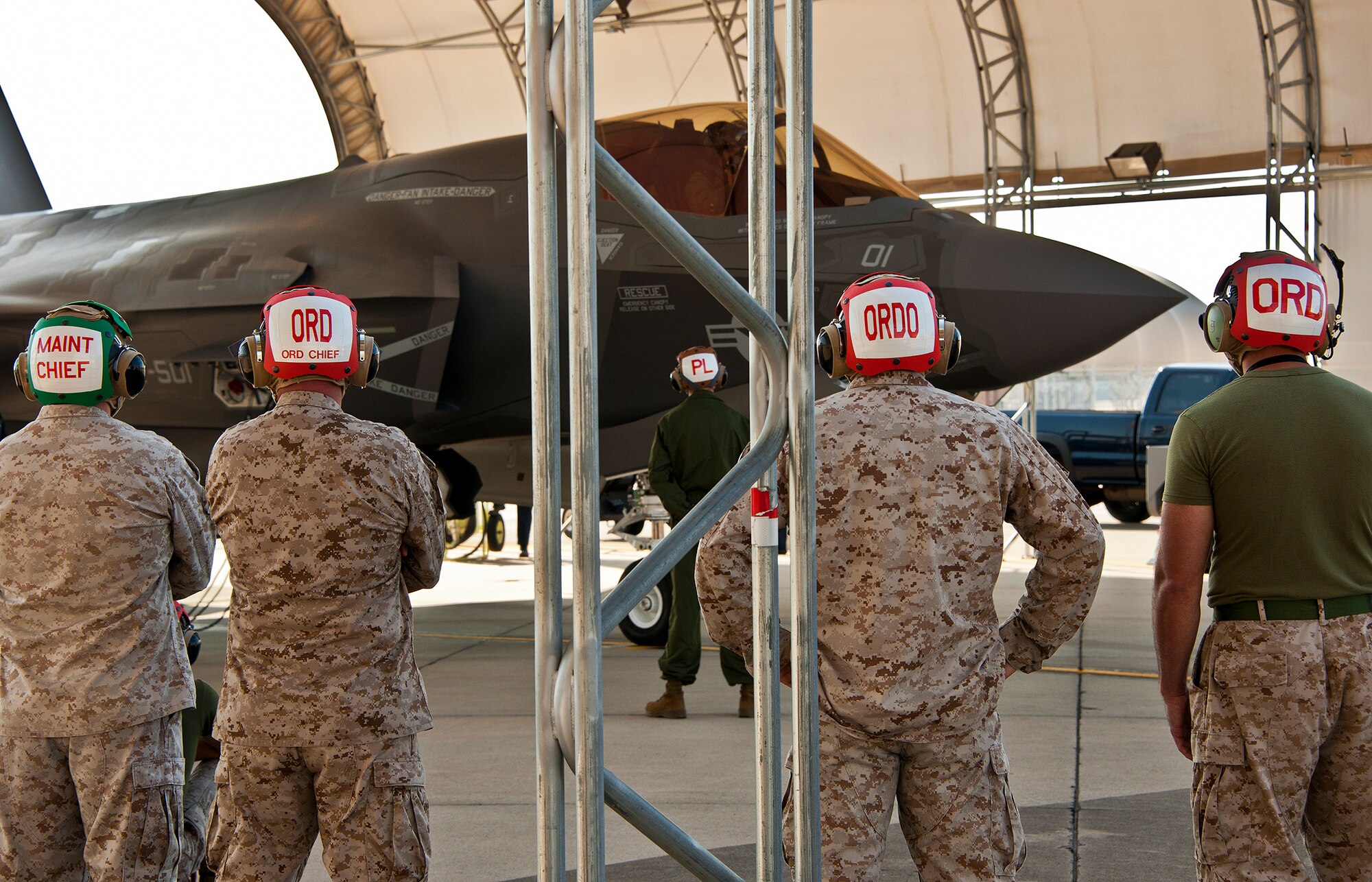 Maintainers with the Marine Fighter Attack Squadron-501 watch as the F-35B Lightning II joint strike fighter performs an engine run May 7 at Eglin Air Force Base, Fla.  (U.S. Air Force photo/Samuel King Jr.)