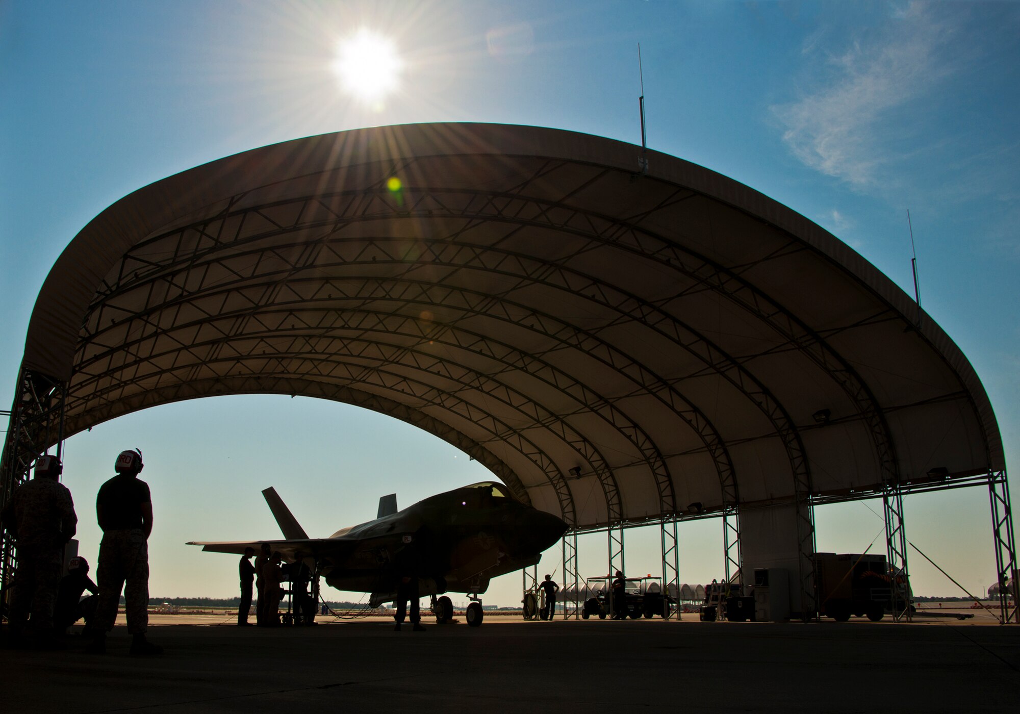 The F-35B Lightning II joint strike fighter performs an engine run underneath a sun shade on the 33rd Fighter Wing flightline May 7 at Eglin Air Force Base, Fla.  (U.S. Air Force photo/Samuel King Jr.)