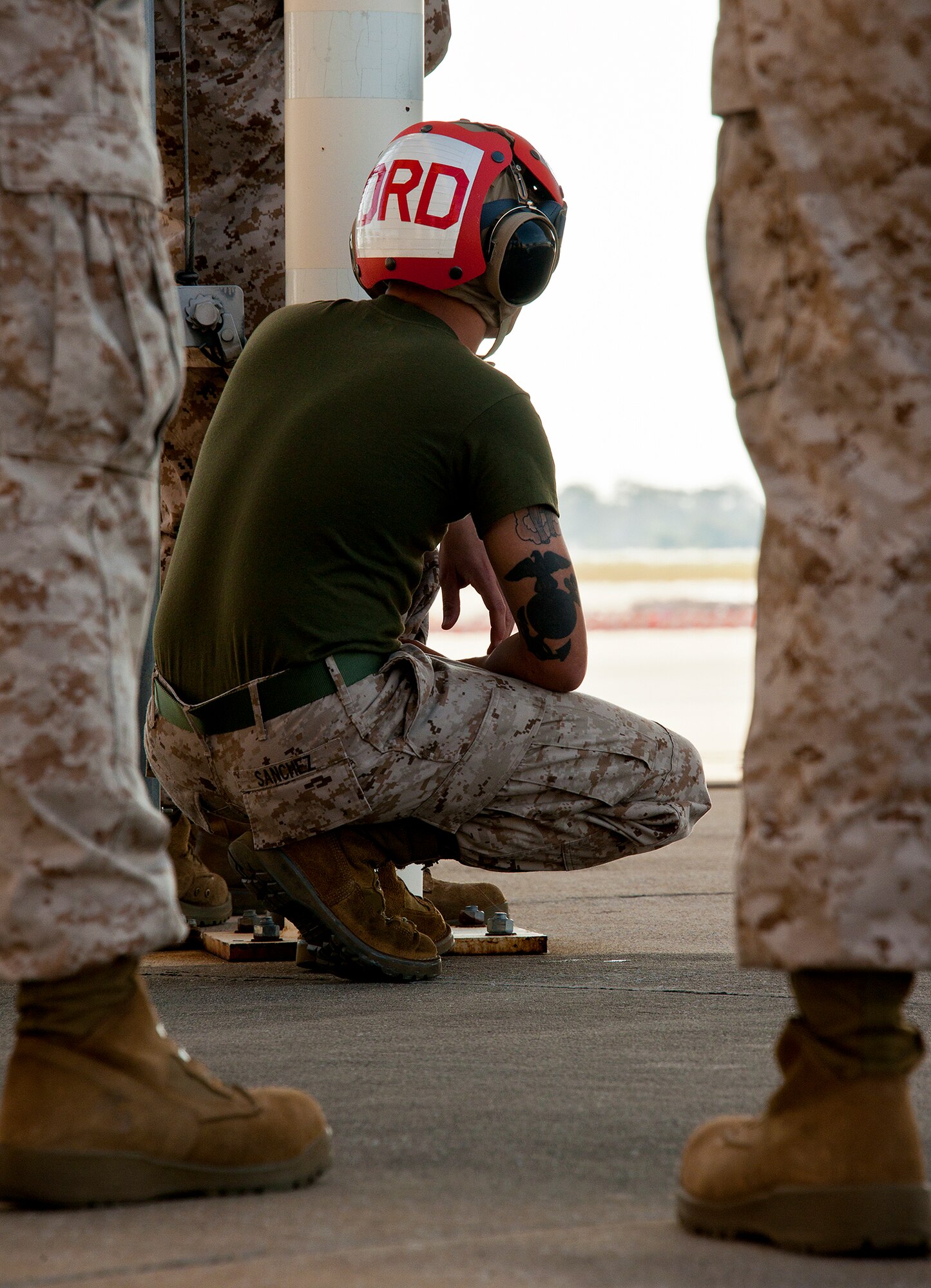 Sgt. Adrian Sanchez, a maintainer with the Marine Fighter Attack Squadron-501, watches as the F-35B Lightning II joint strike fighter performs an engine run May 7 at Eglin Air Force Base, Fla.  (U.S. Air Force photo/Samuel King Jr.)