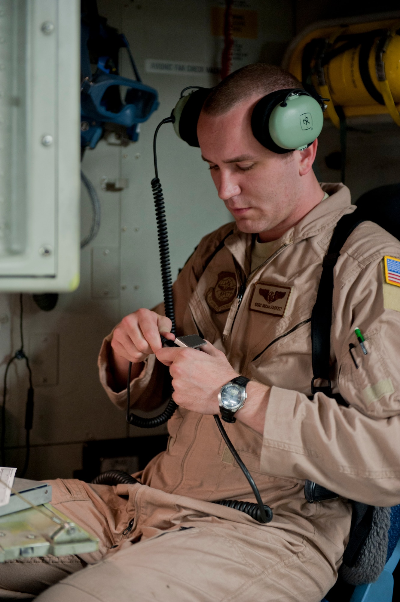 Staff Sgt. Micah Hackett, 6th Airlift Squadron loadmaster, connects his headset on a C-17 Globemaster III May 4, 2012, at Incirlik Air Base, Turkey. The C-17 aircrew from Joint Base McGuire-Dix-Lakehurst, N.J., transported a Turkish air force UH-60 Black Hawk helicopter to Kabul, Afghanistan, May 5, 2012. The joint support mission provided smooth delivery of the helicopter to replace one that crashed December 2011. (U.S. Air Force photo by Senior Airman Anthony Sanchelli/Released)