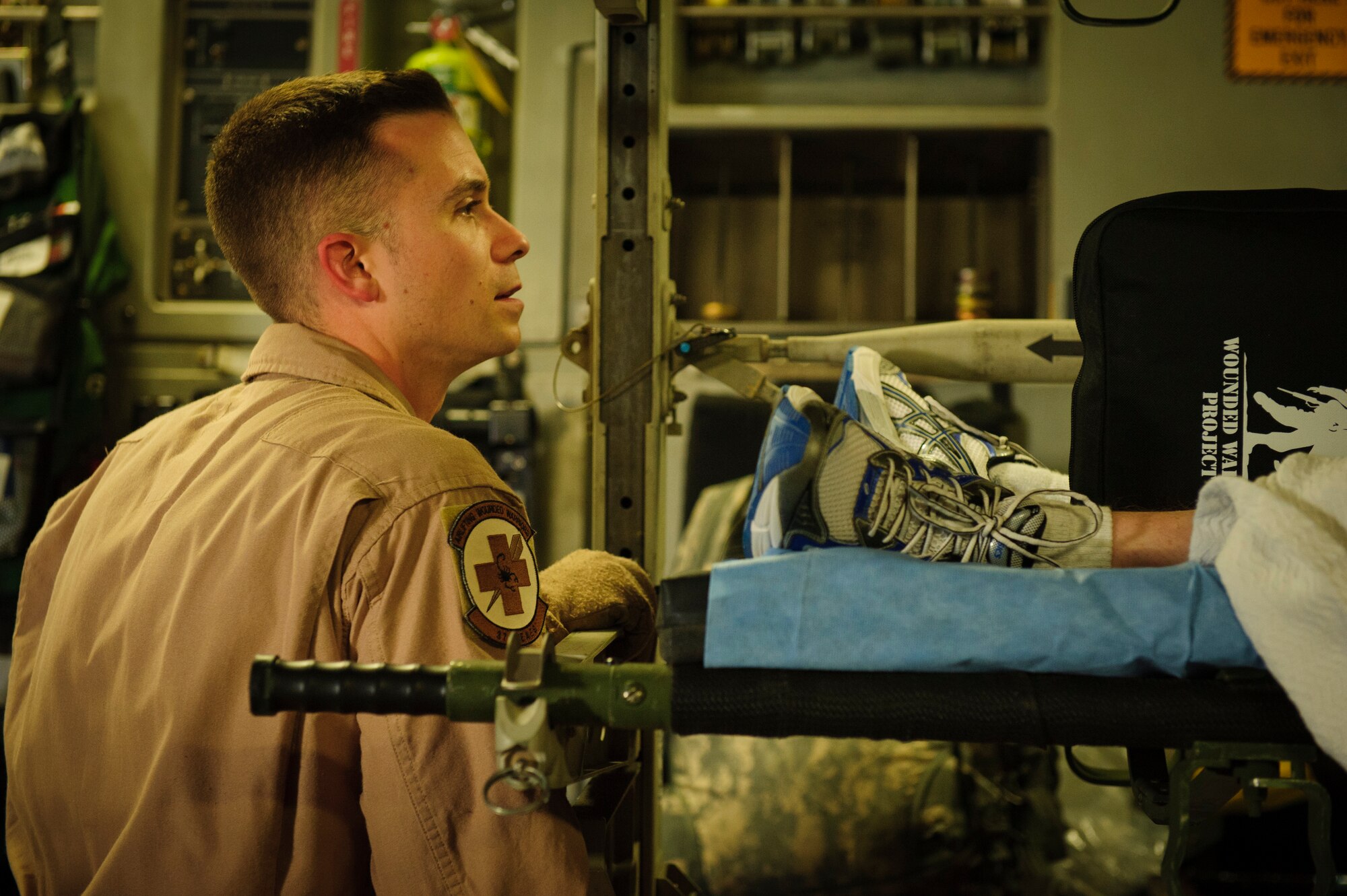 SOUTHWEST ASIA – Tech. Sgt. Travis Shore, 379th Expeditionary Aeromedical Evacuation Squadron medical technician, checks a patient’s equipment before an evacuation mission here April 25, 2012. (U.S. Air Force photo/Staff Sgt. Nathanael Callon)