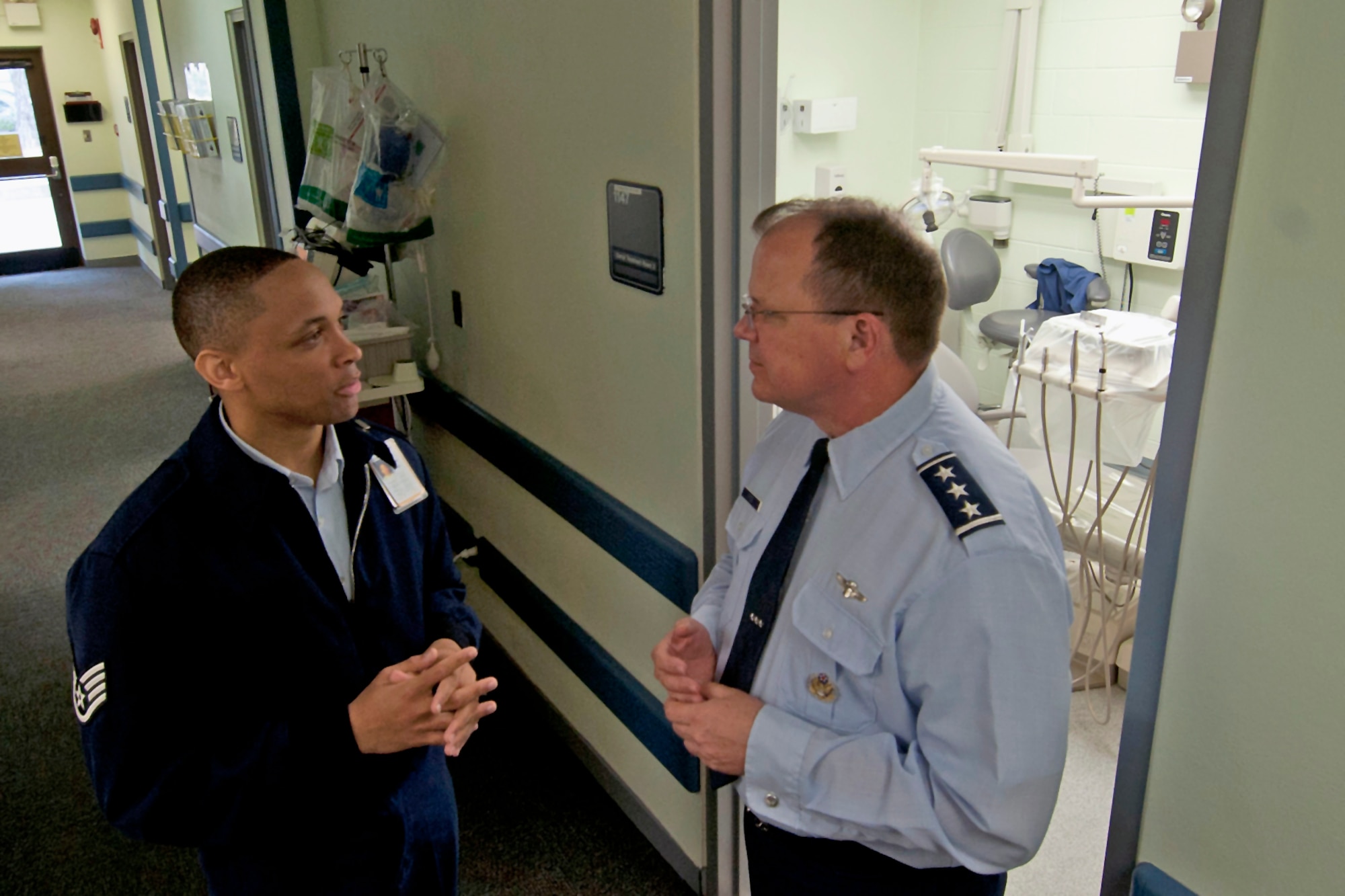 Staff Sgt. Kentarvius Todd, 8th Medical Operations Squadron dental prophylaxis technician and 8th Fighter Wing Airman of the Year, talks with Lt. Gen. Bruce Green, Air Force surgeon general, during the general’s visit to the 8th Medical Group on Kunsan Air Base, Republic of Korea, May 9, 2012. Recently, the 8th MDG received an ‘Outstanding’ rating during its health service inspection in April. (U.S. Air Force illustration/Senior Airman Jessica Hines)   
