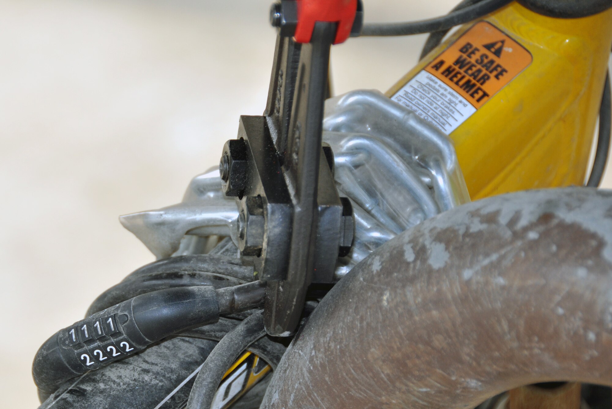 Staff Sgt. Nathan Jaynes, 51st Civil Engineer Squadron unaccompanied housing manager, cuts a lock from an unmarked bicycle during the annual bicycle round-up at Osan Air Base, Republic of Korea, May 8, 2012. Throughout the day more than 100 bicycles were collected from the dorms on Osan. (U.S. Air Force photo/Airman 1st Class Michael Battles)