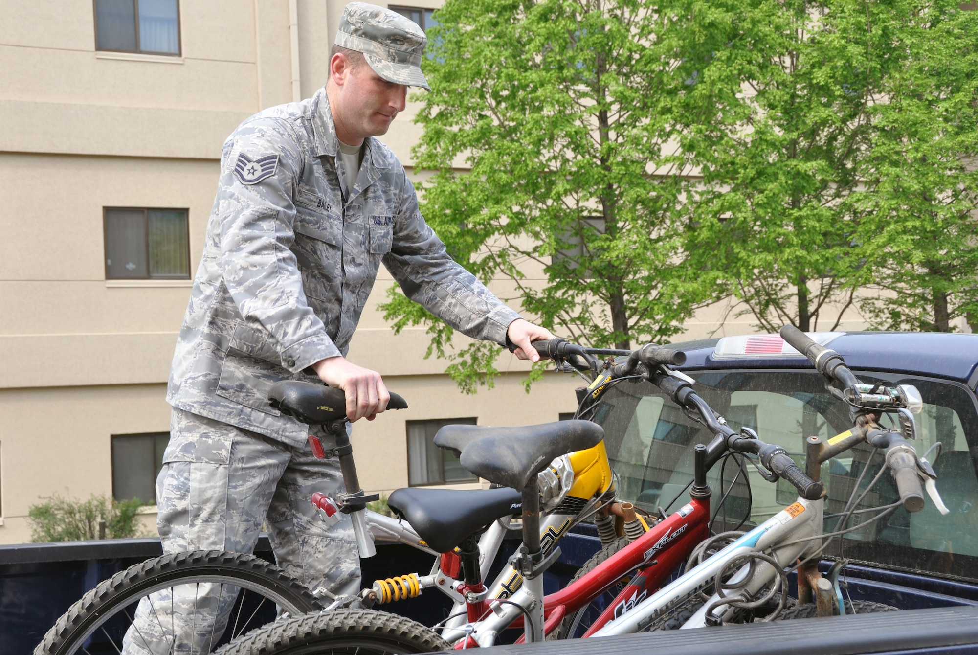 Staff Sgt. Jason Bailey, 51st Civil Engineer Squadron unaccompanied housing manager, loads bicycles collected during the annual bicycle round-up at Osan Air Base, Republic of Korea, May 8, 2012. The round-up removed bicycles that have been abandoned or forgotten through dorm change, temporary duty assignments, or permanent changes of station.  (U.S. Air Force photo/Airman 1st Class Michael Battles)