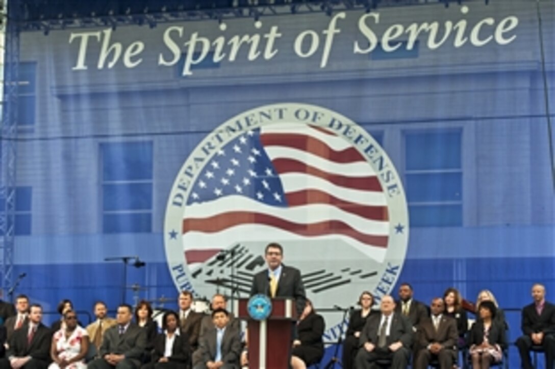 Deputy Defense Secretary Ashton B. Carter thanks civilian Defense Department employees for their hard work and dedication during the Spirit of Service awards at the Pentagon, May 9, 2012.