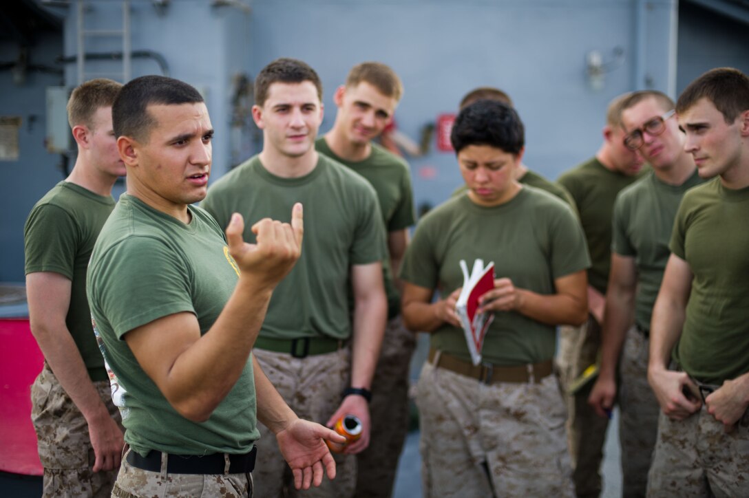 Cpl. Yamil J. Cruznavarro teaches a class on radios during training aboard USS Pearl Harbor here May 9. The 22-year-old Puerto Rico native serves as a radio operator for Battalion Landing Team 3/1, the ground combat element for the 11th Marine Expeditionary Unit. The unit embarked the ship, as well as USS Makin Island and USS New Orleans in San Diego Nov. 14, beginning a seven-month deployment to the Western Pacific, Horn of Africa and Middle East regions.