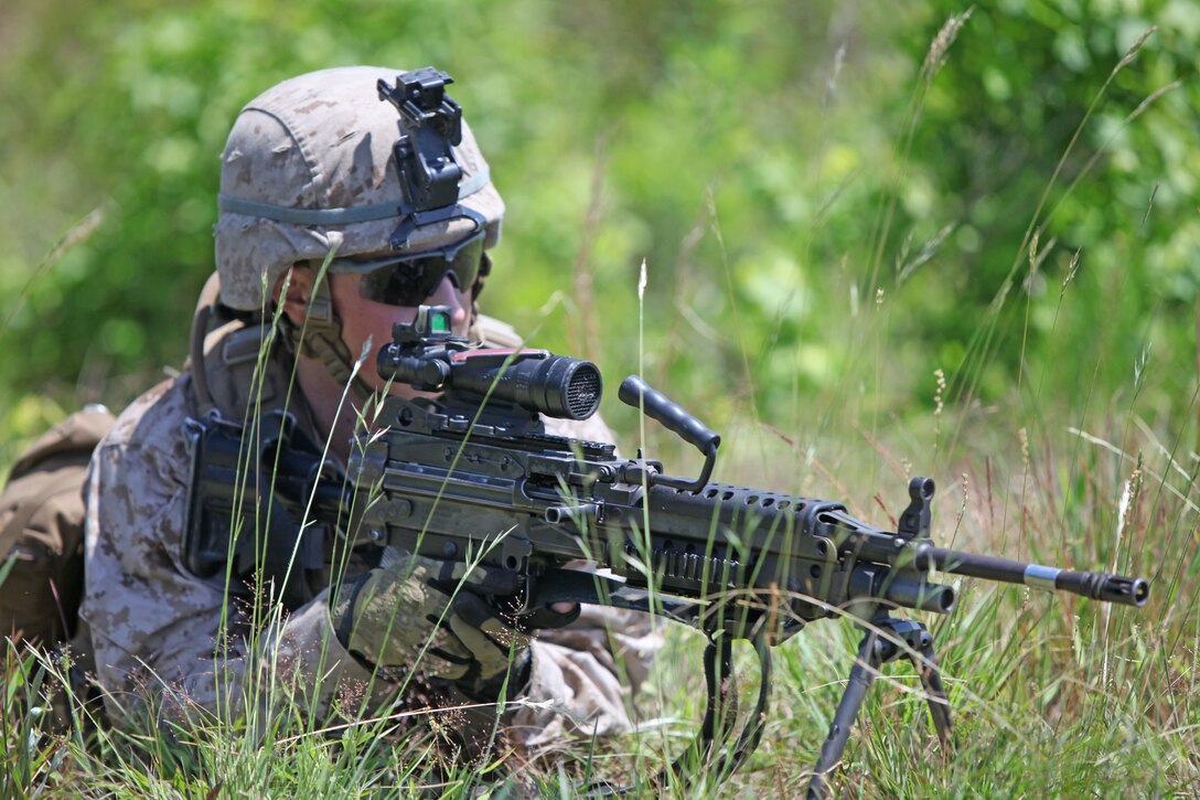 Bethel, Conn., native Lance Cpl. Stephen A. Fike, a rifleman with Golf Company, 2nd Battalion, 2nd Marine Regiment, 2nd Marine Division, aims downrange during a simulated machine gun bunker assault May 10. The simulated assault was part of a two–and-half-week Tactical Small Unit Leadership Course prospective fire team leaders from the battalion participated in the implementation of various weapons systems, tactical movements, communications and land navigation. (Official U.S. Marine Corps photo by: Cpl. Andrew D. Johnston)