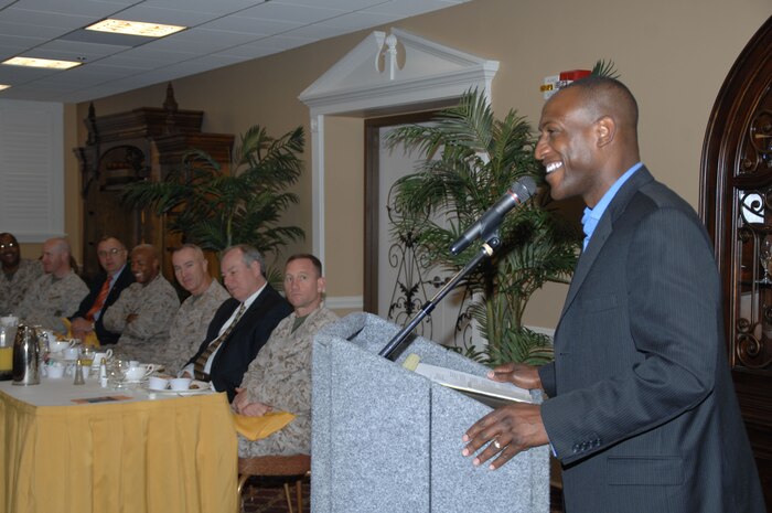 Retired Marine Capt. Ken Bevel, now an associate minister at Sherwood Baptist Church, Albany, Ga., addresses nearly 70 base personnel during the National Day of Prayer observance held at the Town and Country Restaurant’s Grand Ballroom,?May 3.