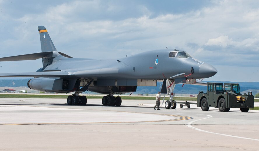 A B-1 taxis off of the runway after completing a high speed pass as part of a Warrior Flyby event conducted by the 37th Bomb Squadron at Ellsworth Air Force Base, S.D., May 4, 2012. The B-1 is the backbone of America’s long-range bomber force, and can rapidly deliver massive quantities of precision and non-precision weapons against enemy forces. (U.S. Air Force photo by Airman 1st Class Zachary Hada/Released)