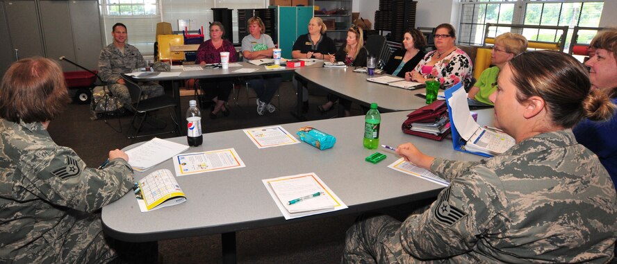 Col. Mark Evans, 22nd Mission Support Group commander, speaks to Parent Advisory Board meeting participants at the Child Development Center May 10, 2012, McConnell Air Force Base, Kan.  The PAB is comprised of CDC, Youth Center and School Age Program parents and meets quarterly to discuss changes, comments, concerns and suggestions, and share information concerning their family needs.  Representatives from agencies such as the Exceptional Family Member Program, Family Advocacy and other child care organizations attended to answer questions and supply information concerning family members.  (U.S. Air Force photo/Staff Sgt. Maria A. Ruiz) 