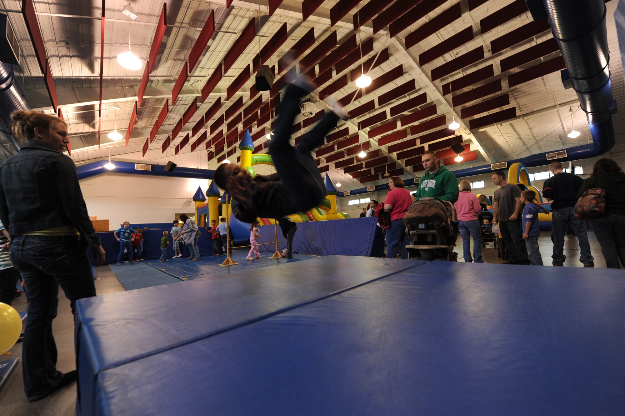 Zachary Topping, 10, flips through the air during the School Carnival on May 8, 2012, on Grand Forks Air Force Base, N.D. (U.S. Air Force photo/Tim Flack)