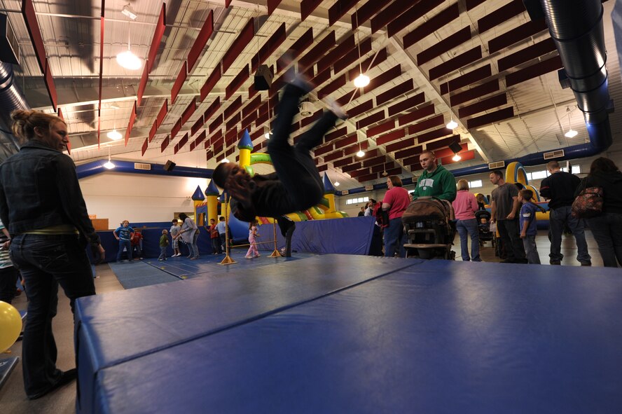 Zachary Topping, 10, flips through the air during the School Carnival on May 8, 2012, on Grand Forks Air Force Base, N.D. (U.S. Air Force photo/Tim Flack)