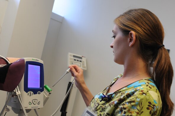 Carissa Morris prepares to take a patient’s vital signs at the 4th Medical Group on Seymour Johnson Air Force Base, N.C., May 8, 2012. Vital signs consist of the patient’s body temperature, pulse rate, respiration rate and blood pressure. Morris, 4th Medical Operations Squadron medical technician, is from Grand Forks, N.D. (U.S. Air Force photo/Airman 1st Class John Nieves Camacho/Released)