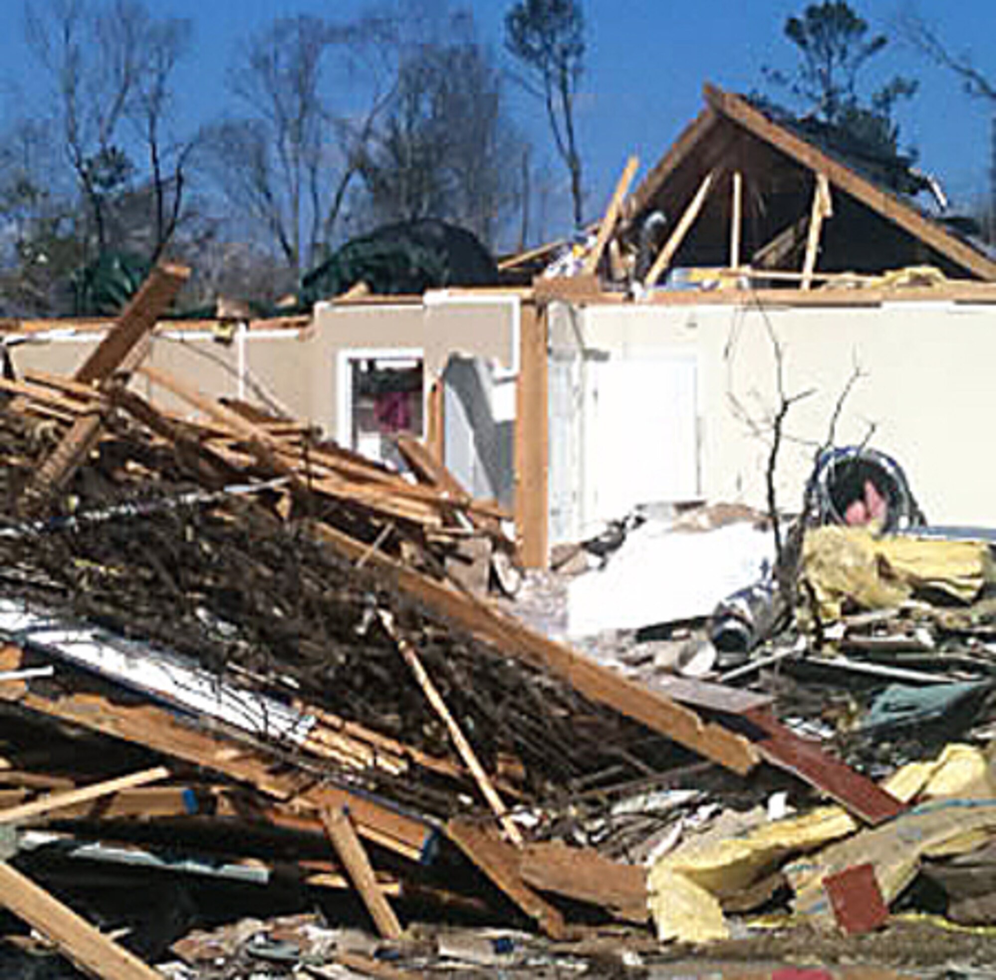 The Birmingham home of Senior Airman Eva Sisson lies in ruins after being struck by a tornado. 