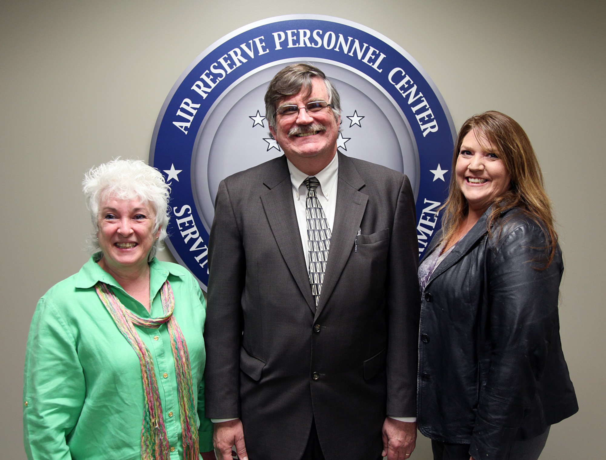 Three employees from the Air Reserve Personnel Center have been selected to receive the annual Rocky Mountain Eagle Award from the Colorado Federal Executive Board May 17, 2012, on Buckley Air Force Base, Colo. The winners are: Diana Rotenbury-Melton, Employee of the Year, Steve Hannan, Executive of the Year and Melissa Castillo, Outstanding Customer Service. (U.S. Air Force photo/Tech. Sgt. Rob Hazelett)