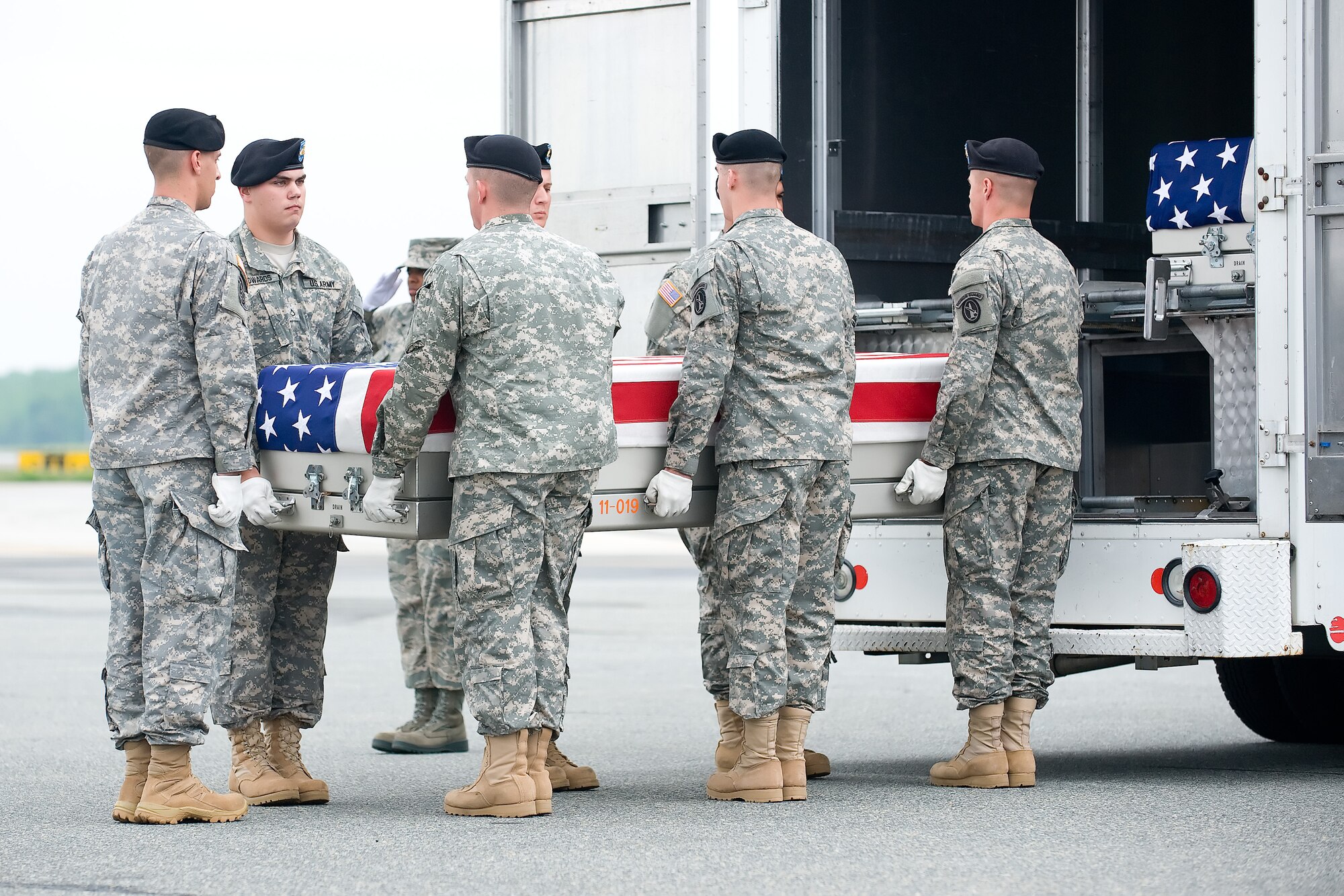 A U.S. Army carry team transfers the remains of Army Spc. Chase S. Marta of Chico, Calif., at Dover Air Force Base, Del., May 9, 2012. Marta was assigned to the 3rd Squadron, 73rd Cavalry Regiment, 1st Brigade Combat Team, 82nd Airborne Division, Fort Bragg, N.C. (U.S. Air Force photo/Adrian R. Rowan)