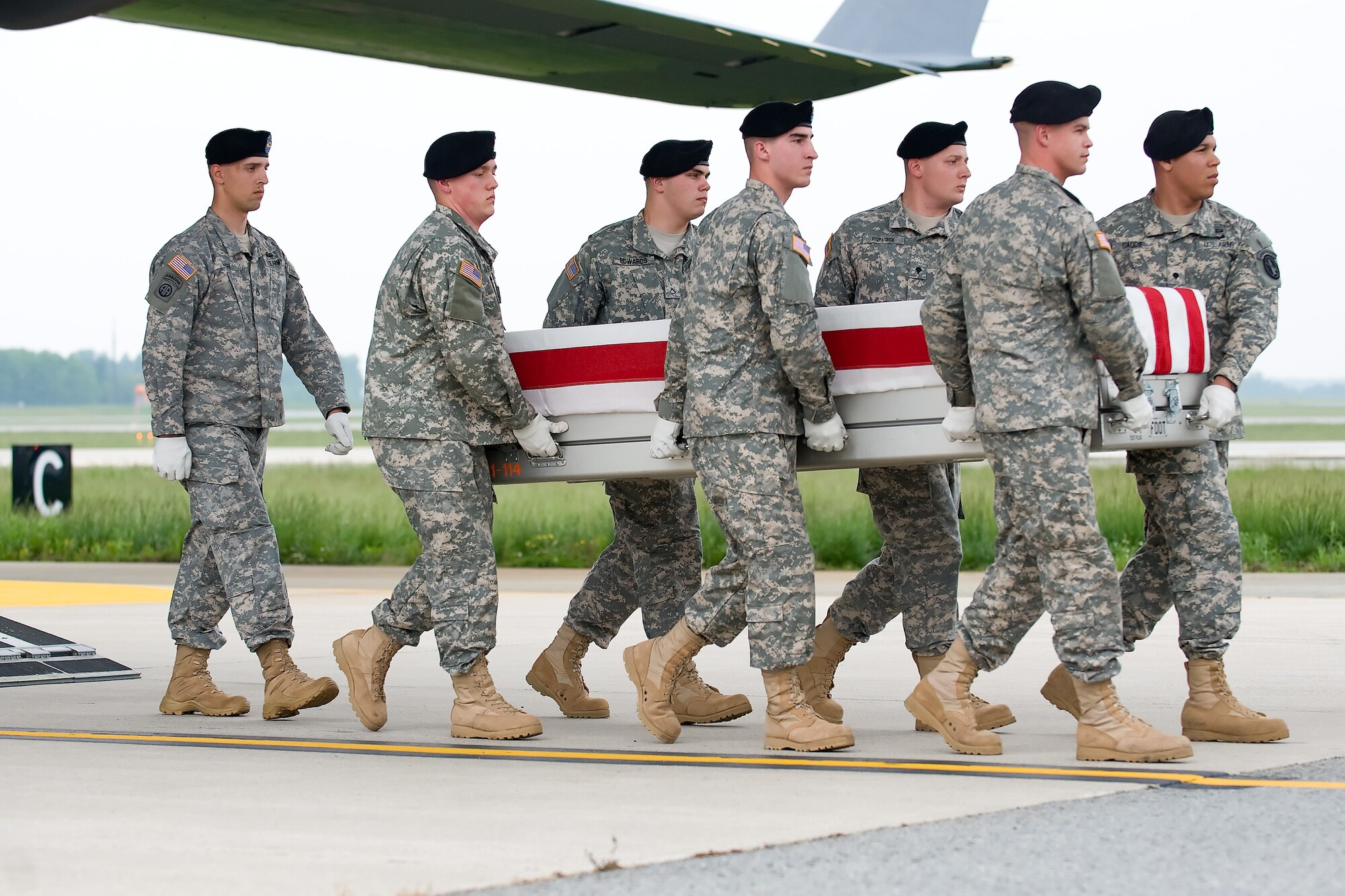 A U.S. Army carry team transfers the remains of Army Staff Sgt. Thomas K. Fogarty of Alameda, Calif., at Dover Air Force Base, Del., May 9, 2012. Fogarty was assigned to the 3rd Battalion (Airborne), 509th Infantry Regiment, 4th Brigade Combat Team (Airborne), 25th Infantry Division, Joint Base Elmendorf-Richardson, Alaska. (U.S. Air Force photo/Adrian R. Rowan)