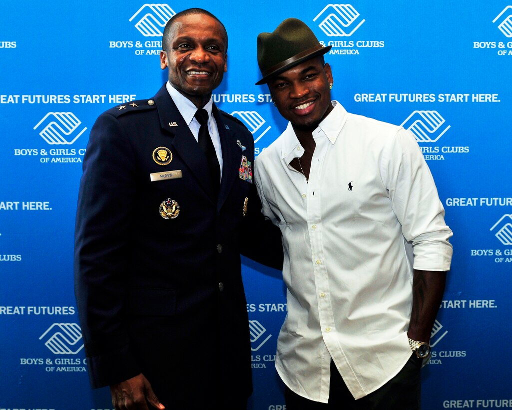 Ne-Yo, a Grammy-winning singer-songwriter, poses with Air Force District of Washington Commander Maj. Gen. Darren McDew during the Boys and Girls Club of America national conference May 2 in San Diego, Calif. During the event McDew was inducted into the BGCA Alumni Hall of Fame which honors former BGCA members who have gone on to make major contributions in their fields to include sports, entertainment, business, medicine, politics, justice, art and education. (U.S. Navy photo by Mass Communication Specialist 3rd Class Charlotte C. Oliver)