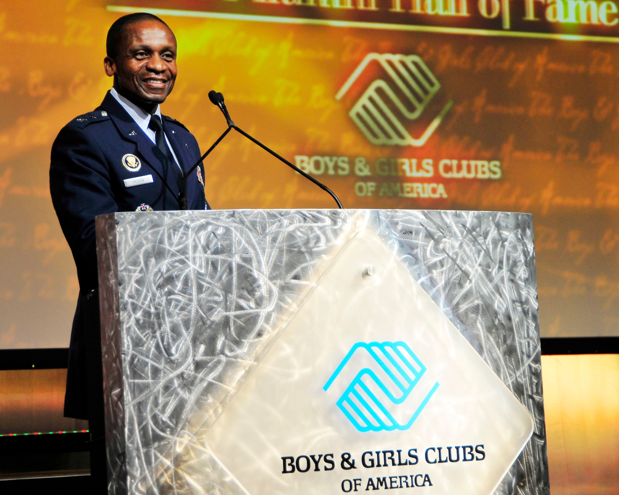 Maj. Gen. Darren McDew, Air Force District of Washington commander addresses the audience during the Boys and Girls Club of America’s national conference May 2 in San Diego, Calif. At the conference McDew talked about the impact the club has had on his life and how it helped him become the leader he is today.  “You don’t have the ability to dream things just because you read about them in a book; sometimes you just have to see it in human form. The Boys Club gave me my early opportunities to see leadership firsthand,” McDew said. “Sometimes you need someone to show you what you can dream.” (U.S. Navy photo by Mass Communication Specialist 3rd Class Charlotte C. Oliver) 