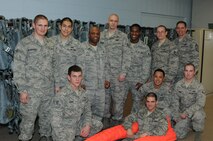 Top from left to right: Senior Airman David Melkersman, Airman 1st Class Adolfo Villegas, Tech. Sgt. Crosby Newbill, Staff Sgt. Joshua O'Brien, Airman 1st Class Terry McKissack, Staff Sgt. Eric Gibson, Chief Master Sgt. Kevin Jurgella. Bottom: Senior Airman Kody Crider, Airman 1st Class Robert Guylitto, Airman 1st Class Ian Carrion, Airman 1st Class Erik Kenney. 

The 5th Operations Support Squadron's Aircrew Flight Equipment's Aircraft Support Section inspects, maintains, and installs B-52 ejection seat survival kits/parachutes for aviator survivability and aircraft deceleration. They perform rapid pre-flight response for aircrew experiencing helmeted-oxygen system and aircrew-ejection seat integration malfunctions. The team also works closely with the 5th Aircraft Maintenance Squadron and the 5th Maintenance Squadron, ensuring the best life sustaining equipment is pre-positioned on the 5th Bomb Wing's aircraft both at home and abroad. (Photo Submission by Tech. Sgt. Mark Frederici)
