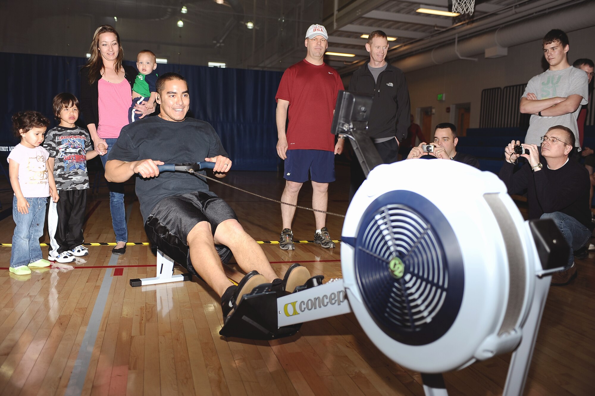 Staff Sgt. Jonathan Every, 5th Aircraft Maintenance Squadron aircraft crew chief, completes his final rowing set for the Air Force Global Strike Command Rowing Challenge at the McAdoo Sports and Fitness Center May 5. Every rowed a total of 1,024,657 meters for the competition, which placed him in third place among top individual rowers in Global Strike Command. (U.S. Air Force photo/Airman 1st Class Kristoffer Kaubisch)