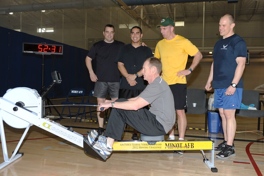 Col. James Dawkins Jr., 5th Bomb Wing commander, rows during the last hour of Air Force Global Strike Command's Rowing Challenge May 5. Team Minot placed first in the competition, rowing the longest distance among the command's bases. Rowing a total of 5,521,161 meters, Team Minot Airmen earned $50,000 in quality of life funds from the command for earning first place. (U.S. Air Force photo/Airman 1st Class Kristoffer Kaubisch)