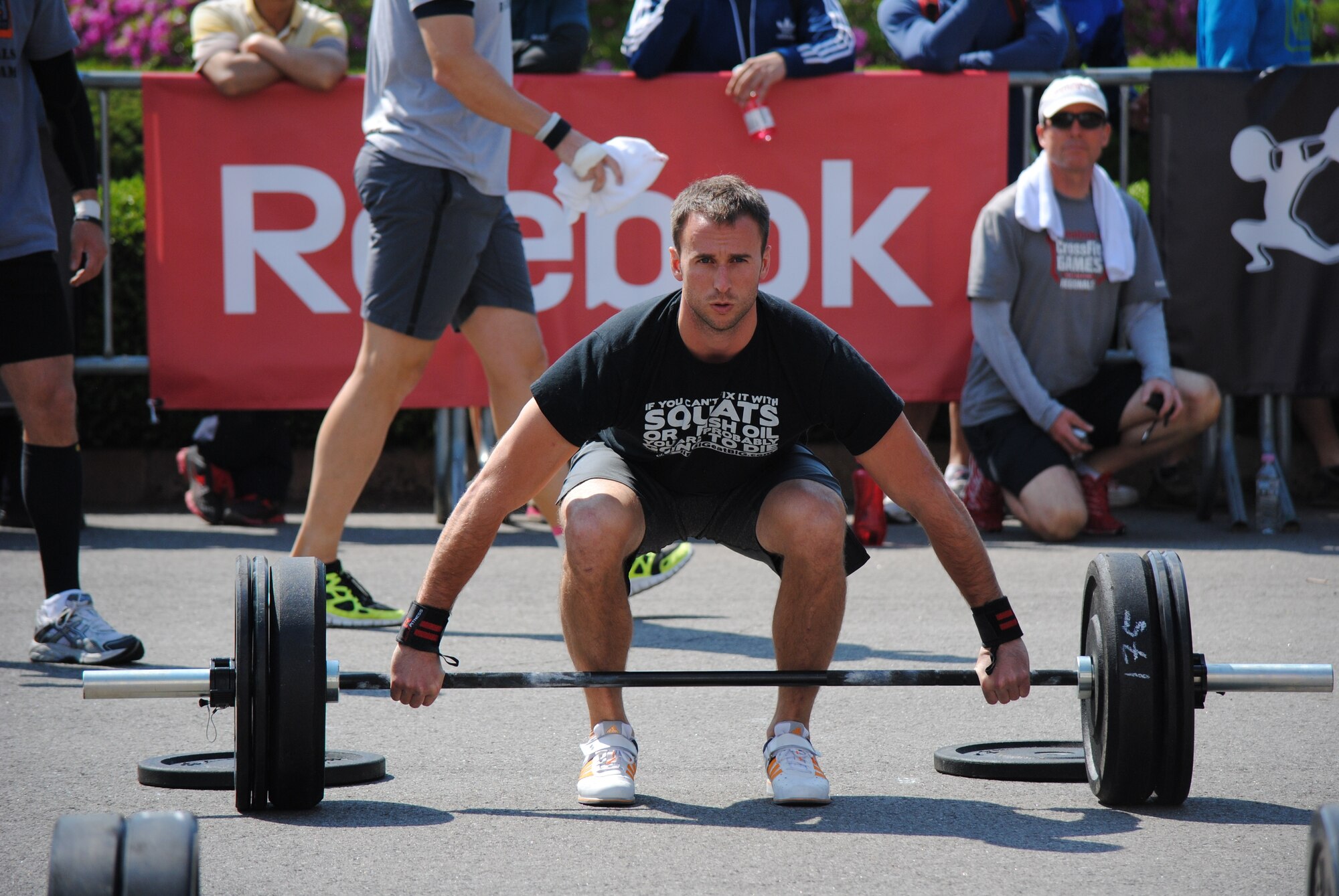 U.S. Air Force Capt. Terry Fregly, 67th Fighter Squadron pilot and CrossFit trainer, prepares to complete an Olympic lift for the Asia Regional CrossFit Games at Gyeonggi-do, South Korea, May 5, 2012. The CrossFit Games is an annual event that tests international CF athletes on a broad range of functional movements with the goal of finding the fittest men and women on Earth. Kadena Shogun CrossFit won four out of six events - claiming the top spot and the title of fittest CrossFit team in Asia. (U.S. Army photo/Capt. K. Rose Banning)