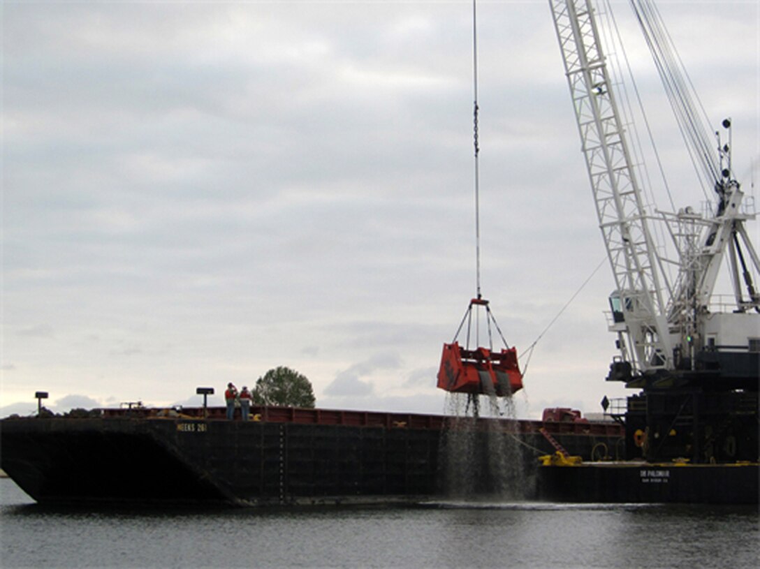 CALIFORNIA — A clamshell dredge begins a five-month project May 2 to remove up to 350,000 cubic yards of material from the federal channel in Newport Harbor, Calif. The Port of Long Beach will use about one-third of the dredged material for its middle harbor redevelopment project. 
