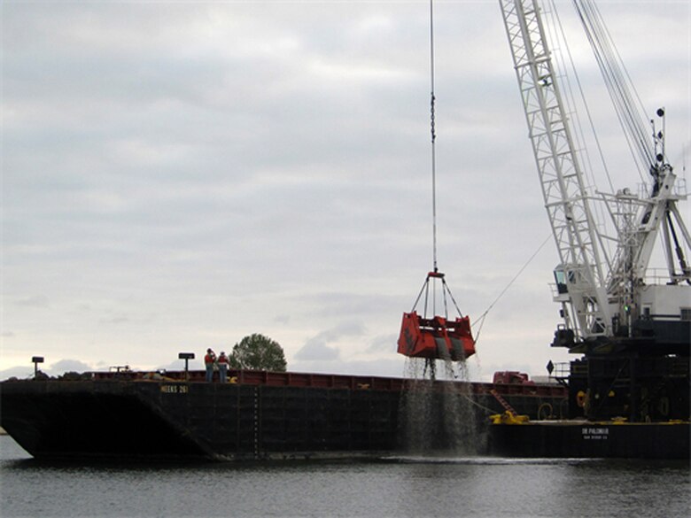 CALIFORNIA — A clamshell dredge begins a five-month project May 2 to remove up to 350,000 cubic yards of material from the federal channel in Newport Harbor, Calif. The Port of Long Beach will use about one-third of the dredged material for its middle harbor redevelopment project. 