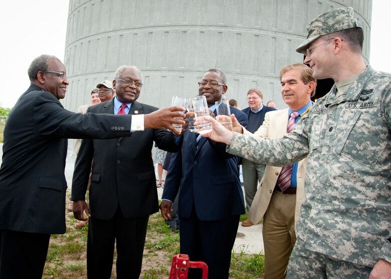 SOUTH CAROLINA — Sen. John W. Matthews, S.C. Senate, Rep. James E. Clyburn, U.S. House of Representatives, 6th Congressional District, S.C., Johnnie Wright, Sr., Chairman, Orangeburg County Council and Chairman, Lake Marion Regional Water Agency, Bill McCall, Executive Vice President and Chief Operating Officer, Santee Cooper, and Lt. Col. Edward Chamberlayne, U.S. Army Corps of Engineers Charleston District Commander and District Engineer, cheers the completion of the 180 ft. John W. Matthews Industrial Park Water Tank May 3, 2012, with the first glass of water poured from the water tank. The water tower will bring potable drinking water to Orangeburg County, S.C. and municipalities of Bowman and Santee. The Charleston District worked very closely with Santee Cooper and Lake Marion Regional Water Agency to complete this project.