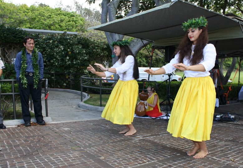 Tehina Mata'ele, left, and Pomaika`i Klein perform a traditional hula to honor the war dead as leaders from the Corps of Engineers joined officials from the Veterans Administration, the American Battle Monuments Commission and others to break ground and bless the new Vietnam Pavilions Project at the National Memorial Cemetery of the Pacific at Punchbowl on May 9.