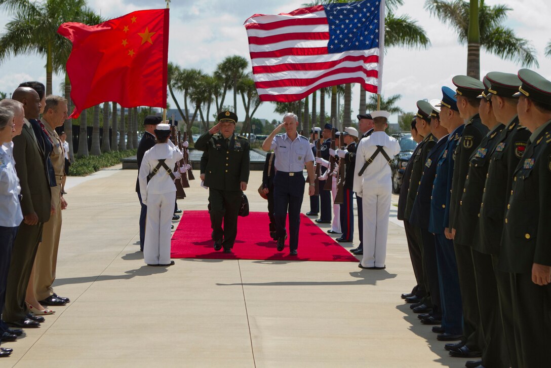 U.S. Air Force Gen. Douglas Fraser, center right, the commander of U.S. Southern Command, hosts an honor cordon to welcome Chinese Minister of National Defense Gen. Liang Guanglie to the command's headquarters in Miami, May 8, 2012. U.S. Defense Secretary Leon E. Panetta hosted Gen. Liang at the Pentagon, May 7, 2012, as part of the first U.S. visit by a Chinese defense minister in nine years.  Liang has been visiting U.S. military installations and meeting with U.S. military leaders to discuss U.S.-China cooperation in areas of mutual interest. 