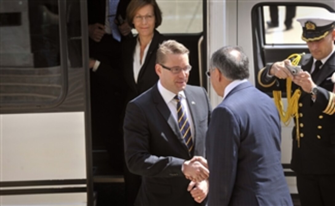 Secretary of Defense Leon E. Panetta, right, welcomes Finland's Minister of Defense Stefan Wallin as he arrives at the Pentagon in Arlington, Va., on May 10, 2012.  Panetta and Wallin will meet to discuss security issues of interest to both nations.  
