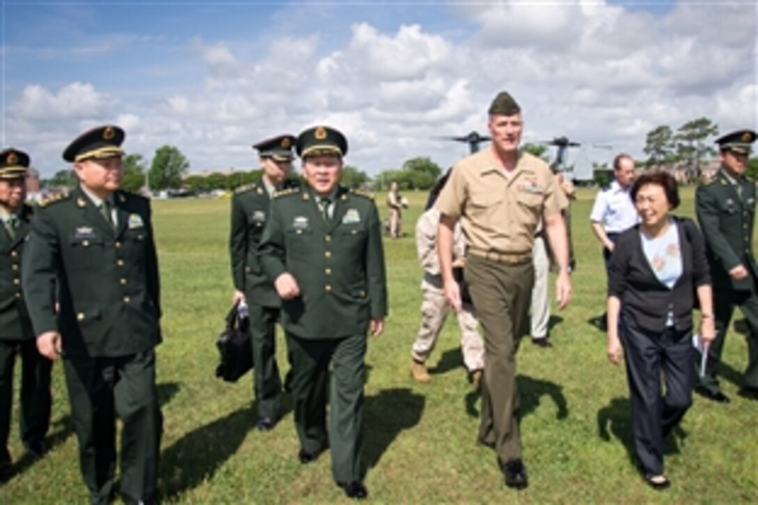 U.S. Marine Corps Brig. Gen. Christopher Owens, right, accompanies Chinese Minister of National Defense Gen. Liang Guanglie on a tour of Marine Corps Base Camp Lejeune, N.C., May 9, 2012. Owens is  the deputy commanding general of II Marine Expeditionary Force. Liang is visiting U.S. military bases at the invitation of U.S. Defense Secretary Leon E. Panetta.