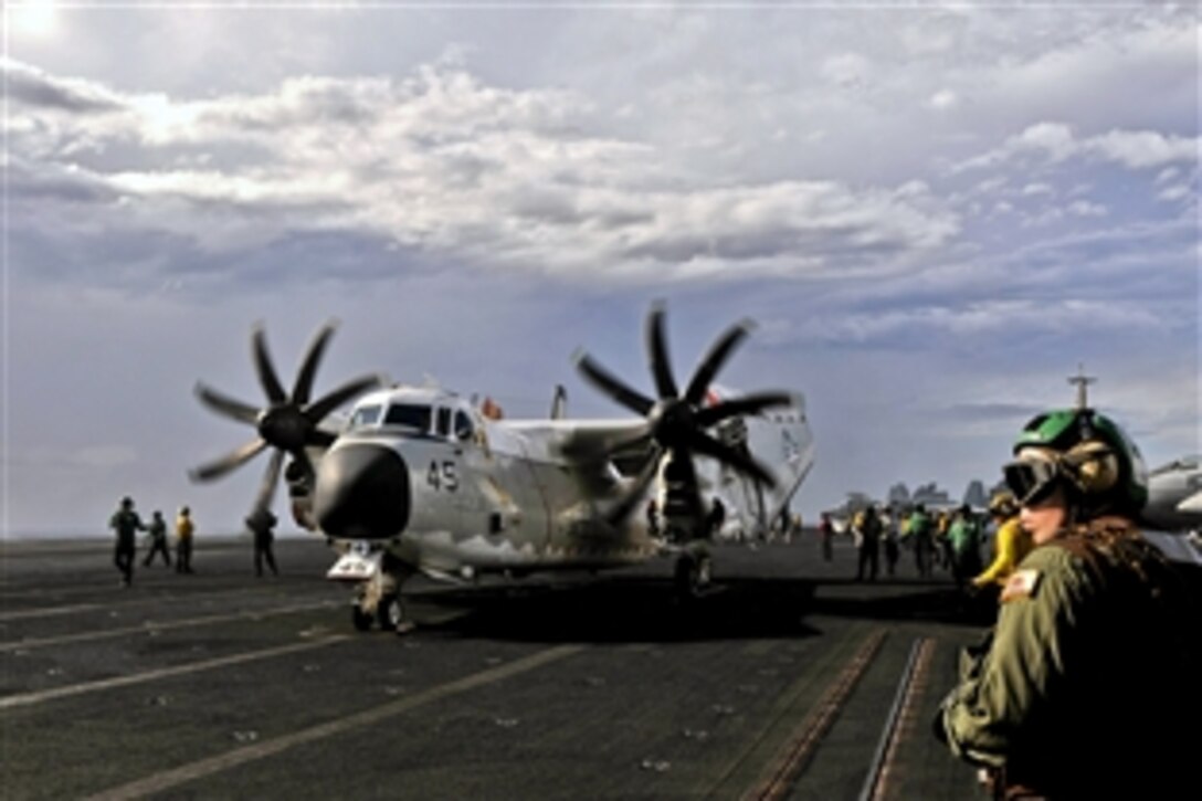 A C-2A Greyhound assigned to Fleet Logistics Support Squadron 40 taxis across the flight deck of the aircraft carrier USS Carl Vinson under way in the Pacific Ocean, May 8, 2012. The Carl Vinson and Carrier Air Wing 17 are deployed to the U.S. 7th Fleet area of operations. 